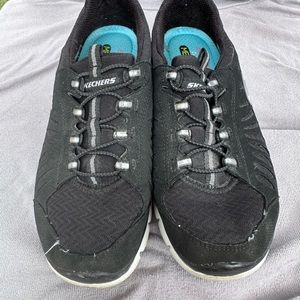 Skechers black slip on sneakers gently worn size 6